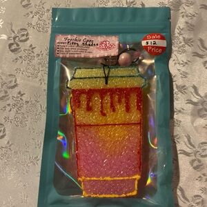 Colorful Car Freshener with Pink and Orange Design